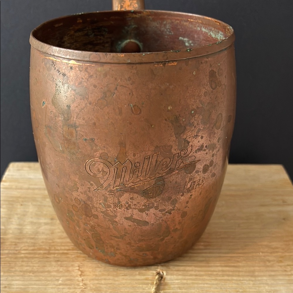 Older copper mug with the Miller brand on front. Preowned